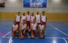 Lamberto, el primero por la derecha en la fila de abajo, con su equipo de baloncesto.
