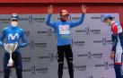 Nairo Quintana (equipo Arkea) celebra en el podio la victoria conseguida en la Vuelta Ciclista a Asturias junto a Antonio Pedrero (Movistar) y Pierre Latour (Total Direct Energie).