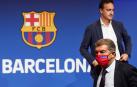 El director general del FC Barcelona, Ferran Reverter y el presidente de la entidad, Joan Laporta, durante la presentación de los resultados de la auditoría al club