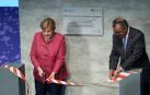 Tedros Adhanom Ghebreyesus, director general de la Organización Mundial de la Salud (OMS), y Angela Merkel inaugurando el “WHO Hub for Pandemic and Epidemic Intelligence”