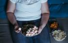 Imagen de una mujer comiendo