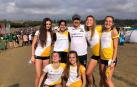 SUBCAMPEONAS DE ESPAÑA. El Grupompleo Pamplona Atlético sub20, ayer. Ana María Feligreras, Jihad Essoubai, el técnico Ignacio Santamaría, Nadya Collantes y Sara Prados. Abajo: Rebeca Miguelena  y Violeta Alonso.