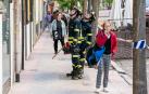 Bomberos del Ayuntamiento de Madrid siguen trabajando en las inmediaciones de la vivienda del barrio Salamanca donde este viernes hubo una explosión de gas