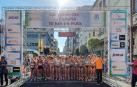 Salida de la prueba de 10K en ruta, con Maitane Melero de amarillo y negro en el centro, con el dorsal 1