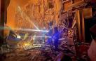 Rescatistas junto a una zona destruida por misiles en Odesa