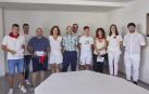 Ganadores de los concursos de carteles y fotografía, con la alcaldesa, Ana Góngora y algunos ediles. El primero por la izquierda, Oskar Montero, autor del cartel ganador.
