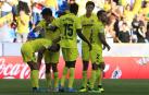 Los jugadores del Villarreal celebran el primer tanto, obra de Gerard Moreno