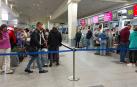 Colas en el mostrador de facturación del aeropuerto de Domodédovo en Moscú de rusos que quieren abandonar el país tras el anuncio de Putin de movilización de reservistas