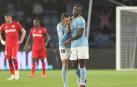 Los jugadores del Celta, Iago Aspas (i) y el ghanés Joseph Aidoo, celebran el primer gol del equipo gallego