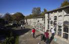 Fotos del día de Todos los Santos en el cementerio de Pamplona.