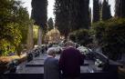 Fotos del día de Todos los Santos en el cementerio de Pamplona.