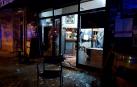 Desperfectos en el bar Ezpala tras el enfrentamiento entre ultras de Osasuna y Barcelona