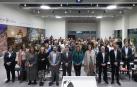 El consejero Irujo y las consejeras Ollo y Gómez posan con asistentes al acto.