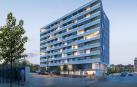 Imagen de un edificio con varios apartamentos