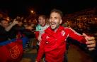 Fotos de la celebración con los jugadores en la Plaza del Castillo./