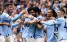 Los jugadores del City celebran uno de los goles
