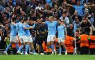 Los jugadores del City celebran uno de los goles anotados por Bernardo Silva (dcha.) contra el Real Madrid