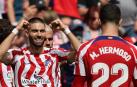 Carrasco celebra el primer gol del Atlético