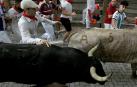 Tocado con gorra blanca, Bill Hillmann en el encierro de este miércoles