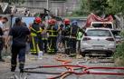 Los bomberos trabajan en el lugar del ataque con misiles en Kyiv, Ucrania, 30 de agosto de 2023