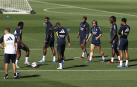 Los jugadores del Real Madrid durante el entrenamiento de este martes, 26 de septiembre