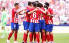 Los jugadores del Atlético de Madrid celebran el tanto de Griezmann de penalti que les dio el triunfo