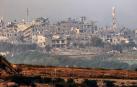 Los edificios destruidos en la parte norte de la Franja de Gaza se ven desde Sderot, cerca de la frontera con Gaza, en Israel