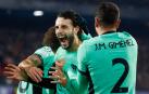 El Atlético gana con suerte en Róterdam y se mete en octavos de final