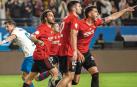garciaRobert Lewandowski celebra el 1-0 mientras David García levanta el brazo ante el árbitro para reclamarle falta previa