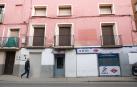 Edificio de la calle San José de Corella que fue ‘okupado’ en verano, con sus puertas y ventanas tabicadas