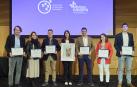 Izda a dcha: Juan Antonio Aranzabal (Graftech Ibérica), Oiane Elizaga (BeePlanet), Pello Recondo (Focke Meler), Gema Acín (Grupo Enhol), premio Azul; José Antonio Blanco (Ardena Pamplona), Mar Sánchez (Lozy´s Pharmaceuticals) y Asier Antso (Nasuvinsa) con  los sellos de empresas saludables.