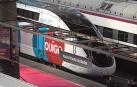 Trenes de Ouigo y Renfe en la estación de Atocha en Madrid