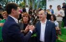 Imanol Pradales saluda a Jordi Turull (Junts) ante la senadora Uxue Barkos, en el mitin del PNV en Bilbao