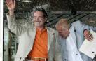 Carlos Baturín, con camisa naranja, el día de su boda en Madrid
