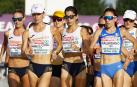 Laura García-Caro (2 por la izda.) junto a las españolas Gonzalez y Montesinos y la vencedora final, la italiana Palmisano (dcha.) en un momento de la prueba