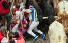 Llegada a la plaza de toros en el tercer encierro de San Fermín con toros de Victoriano del Río. |