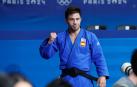El judoca español Francisco Garrigos tras lograr la medalla de bronce al finalizar su combate de Judo -60 kg Masculino ante el georgiano Giorgi Sardalashvili, durante los Juegos Olímpicos de París 2024
