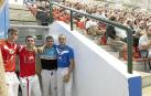Iztueta, Altuna III, Tolosa y Laso posan en buena armonía en el pasillo del vestuario del Aritzbatalde, que registró una buena entrada