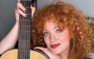 Yhael May con su guitarra en una imagen promocional