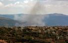 Columna de humo en la localidad de Khiyam, cerca de la frontera entre Líbano e Israel
