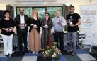 Representantes de La Gota de Leche, Hope & Progress y Concapa Navarra, en la presentación