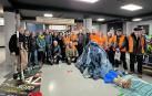 Responsables de la exposición junto con miembros de la plataforma social de Tafalla y del grupo de voluntariado urbano