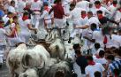Fotos del sexto encierro de San Fermín con toros de Escolar. |