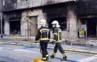 Fotos del incendio de un bazar en la Rochapea.