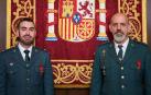 Los guardias civiles Edgar Royo y Arturo Reboleiro recibieron la condecoración de Protección Civil por su labor al rescatar de un coche a unas personas que habían quedado atrapadas por las fuertes lluvias en Caparroso