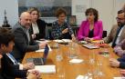 La delegación socialista que acudió ayer a la reunión de los socios de Gobierno.
