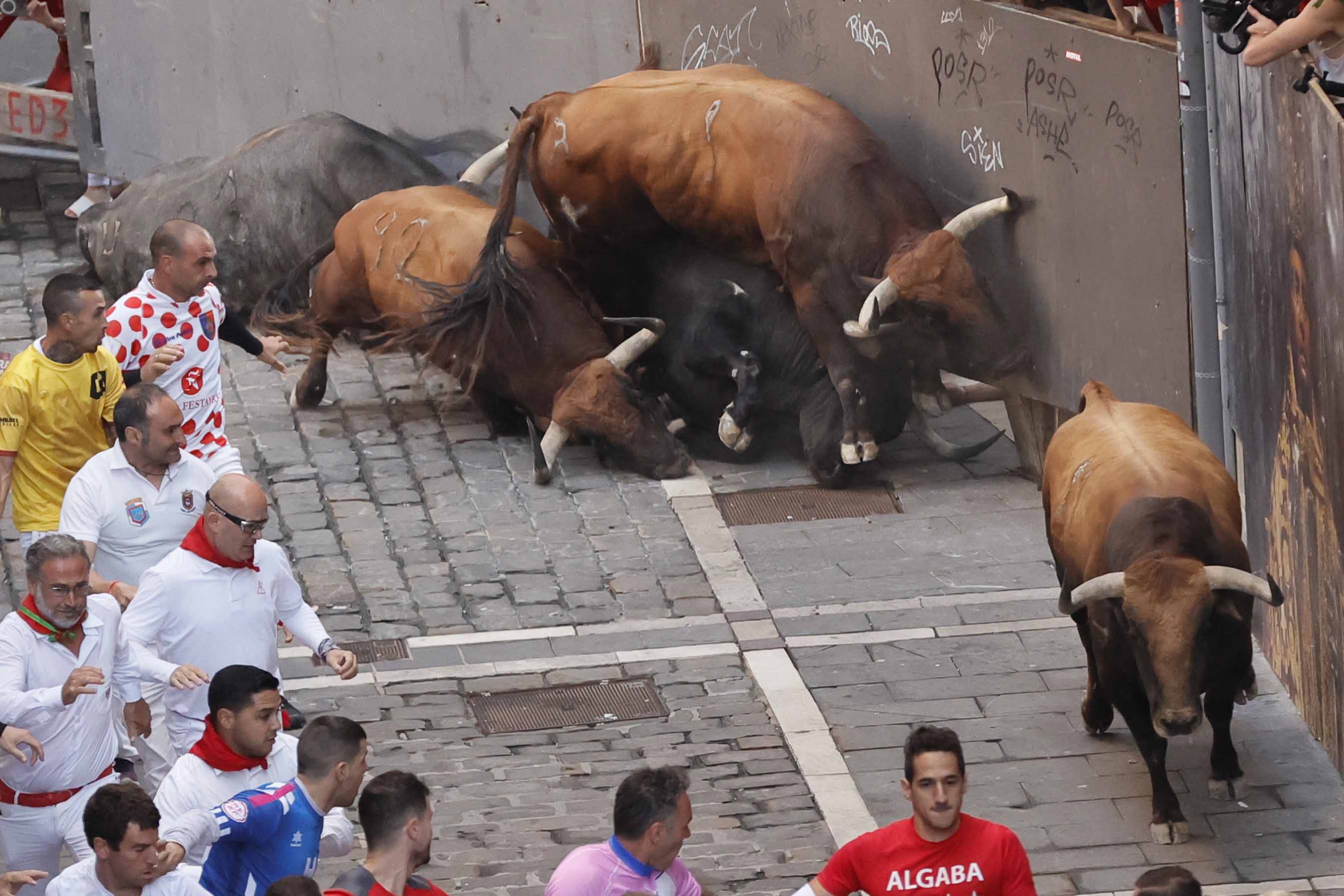 Fotos del quinto encierro de San Fermín 2022 cogidas, heridos por asta